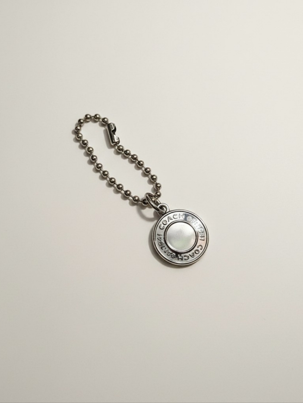 Coach Silvertone Hangtag Bag Charm